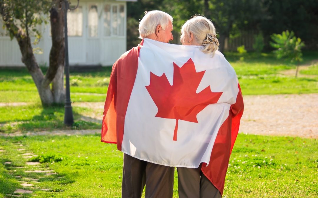 Senior couple and Canadian flag